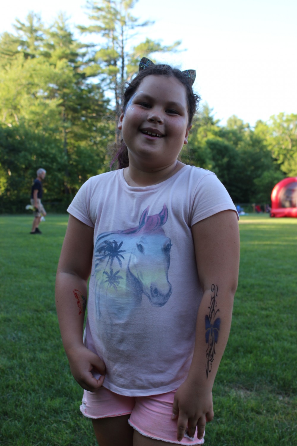 Loving her airbrush tattoos that were done at Canton Parks on 6/26/22!