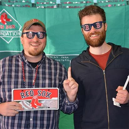 employees with Boston Red Sox props taking a Party Portrait